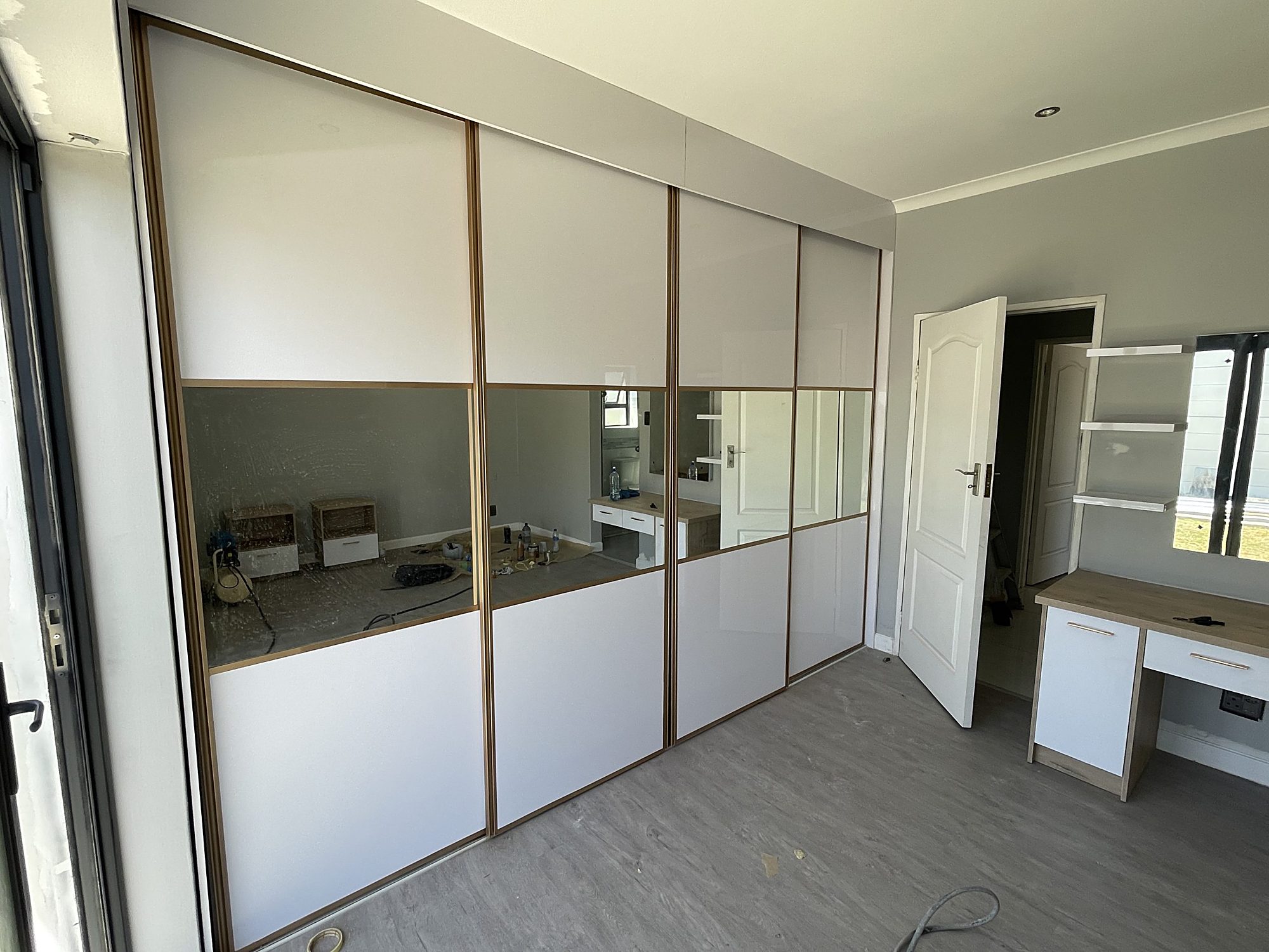 Sliding wardrobe doors restored by ALR Aluminium Restoration in Cape Town